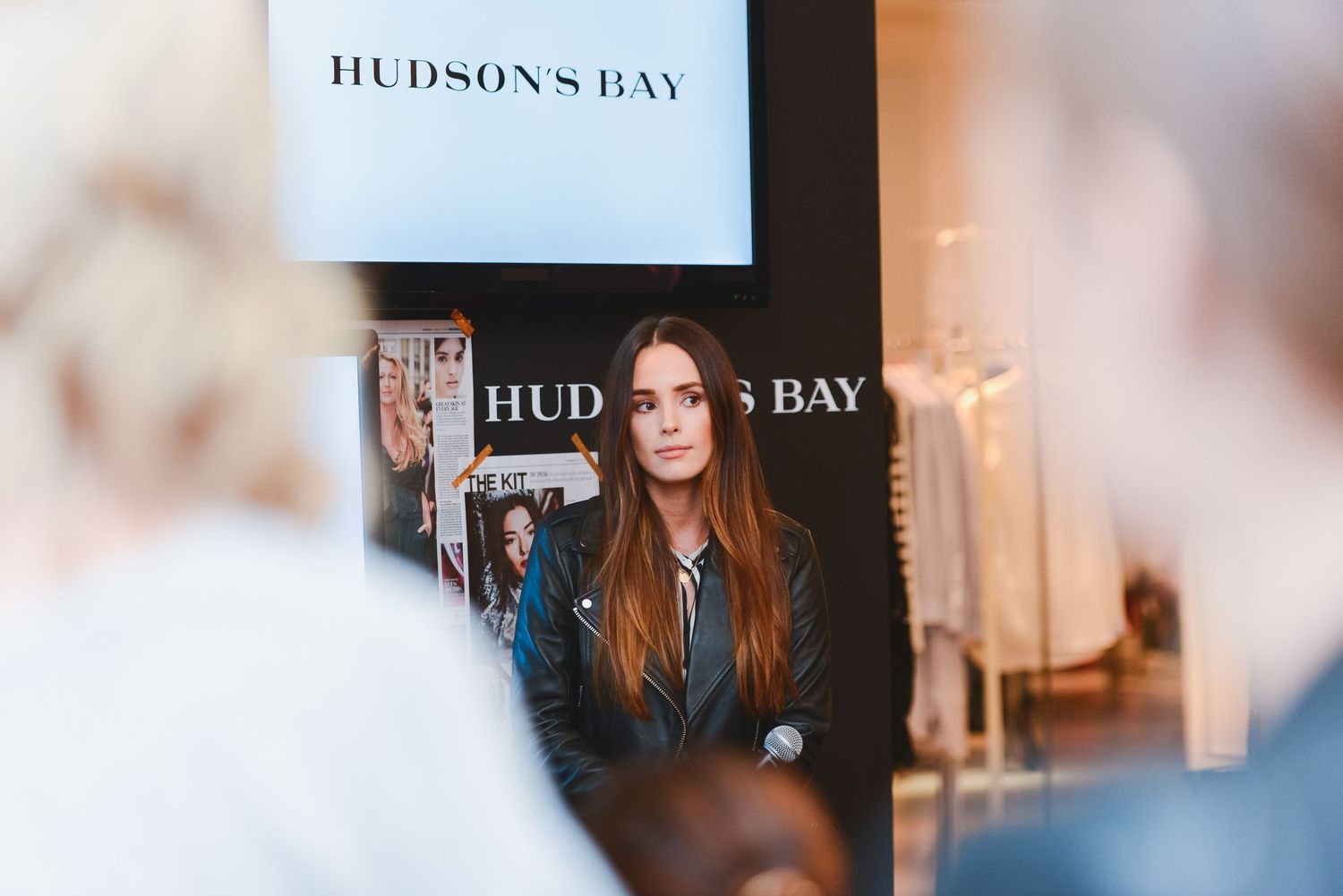 Woman with long hair photographed at Hudson's Bay retail event.