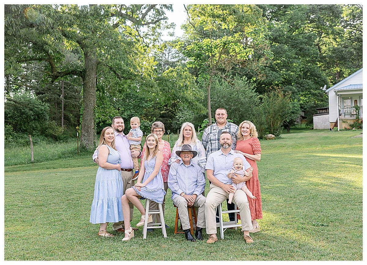 group of people smiling, green grass, several generation, chattanooga family photographer, newborn photos near me