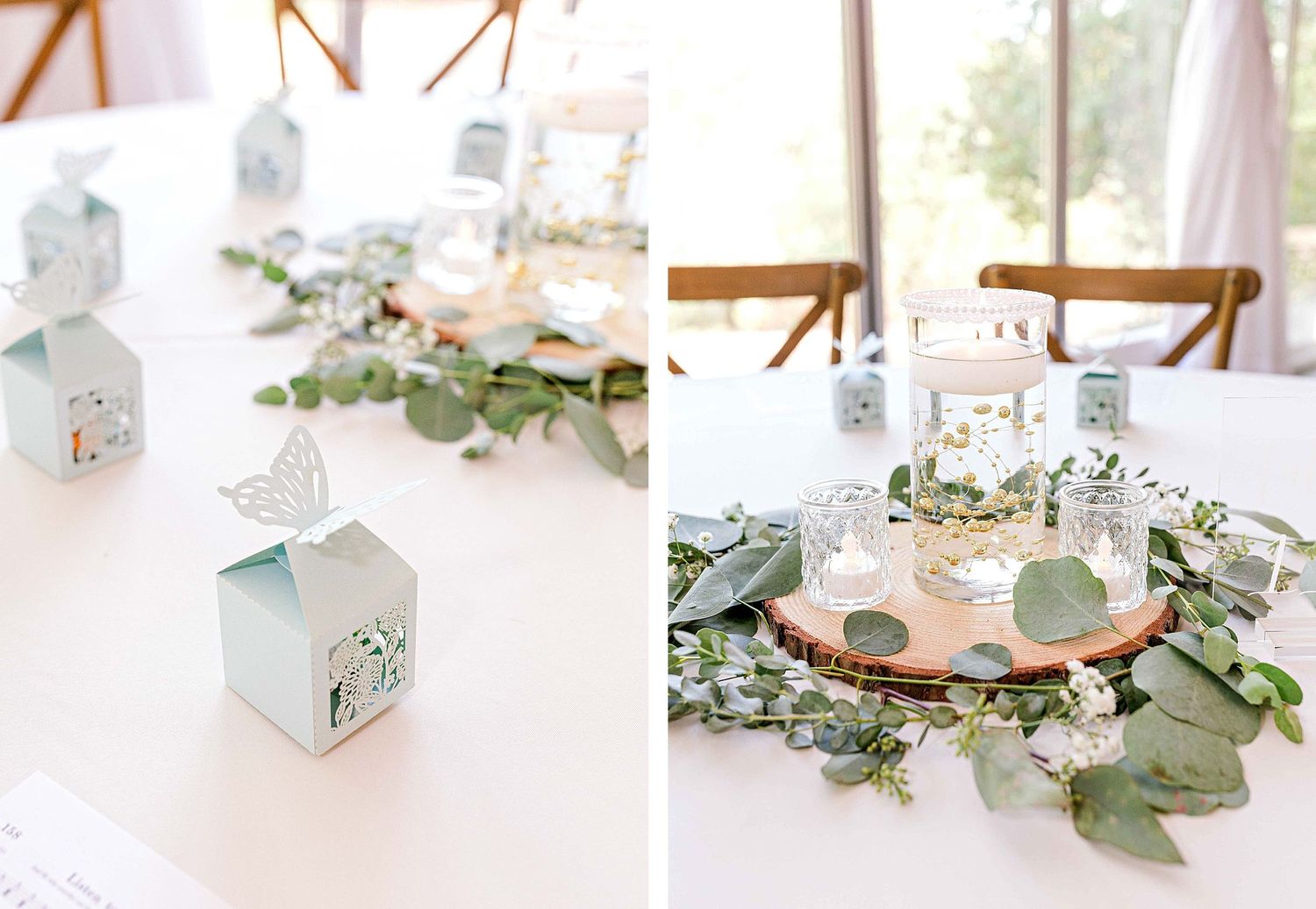 Wedding table decorations with eucalyptus garland and light blue favor boxes on white linens.