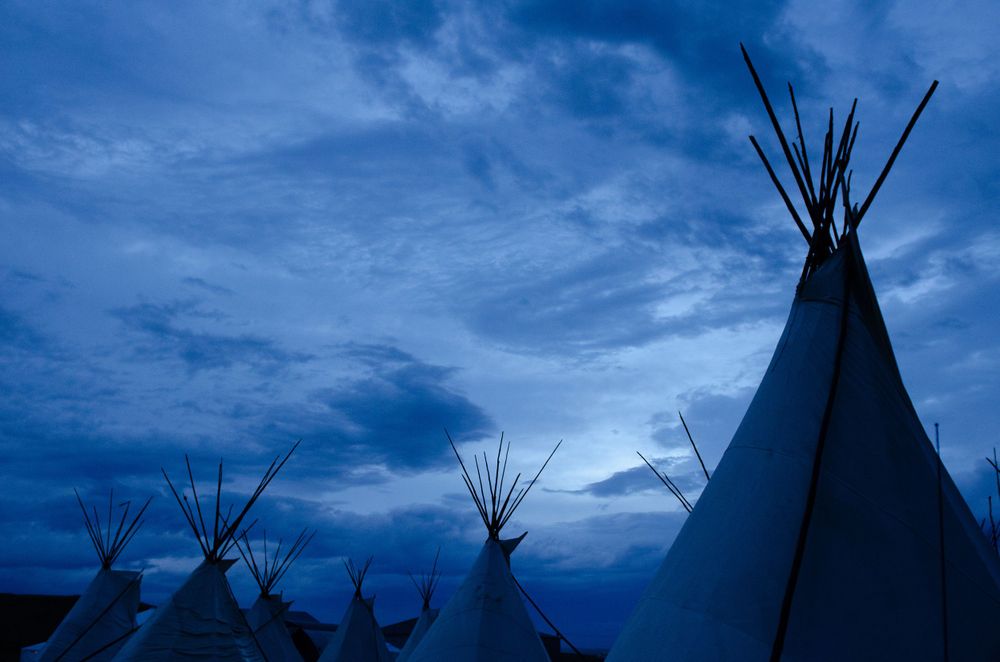 Teepees on the Fort Peck Assiniboine & Sioux Tribes, Northeast Montana. Tipis on prairie- Dakota Nakota, Wolf Point, MT