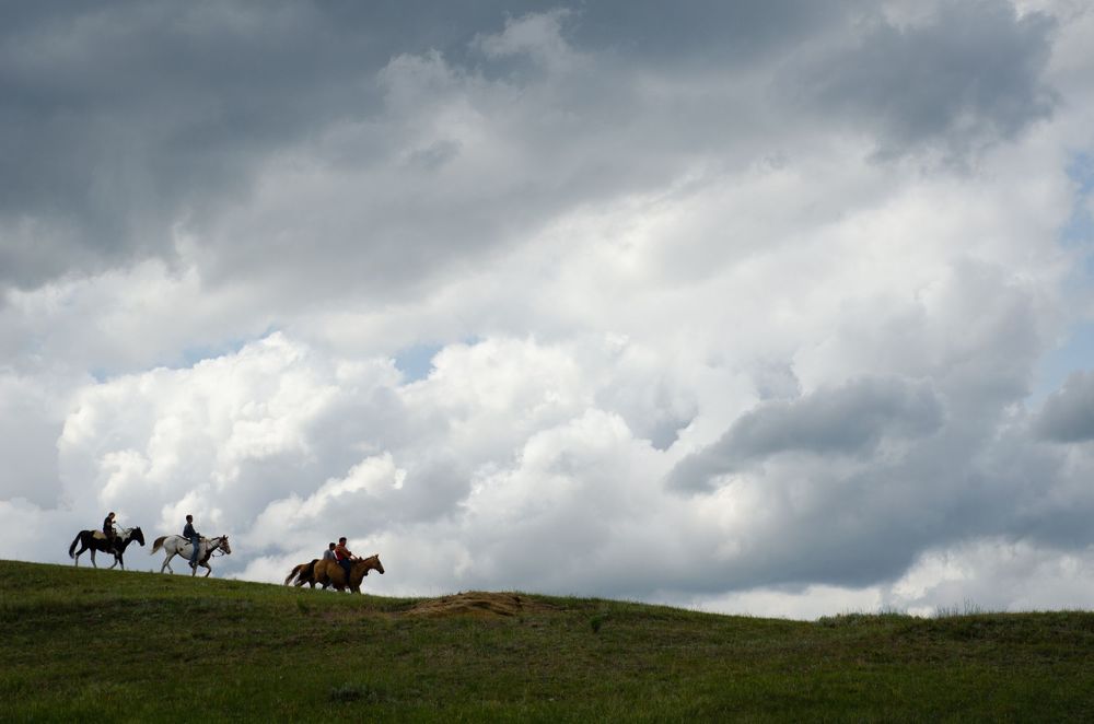Horseback Riders on the Fort Peck Assiniboine & Sioux Tribes in Northeast Montana. Horses on the prairie- Dakota Nakota