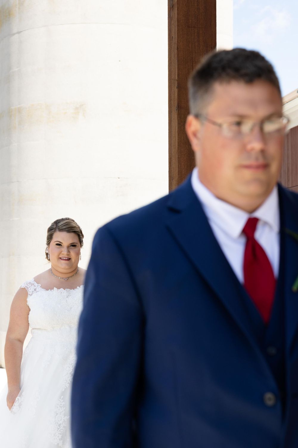 A sweet first look moment unfolds between a couple before their wedding ceremony.