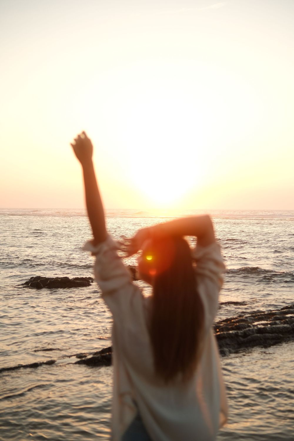 girl blurry background sharp sunset, good vibes