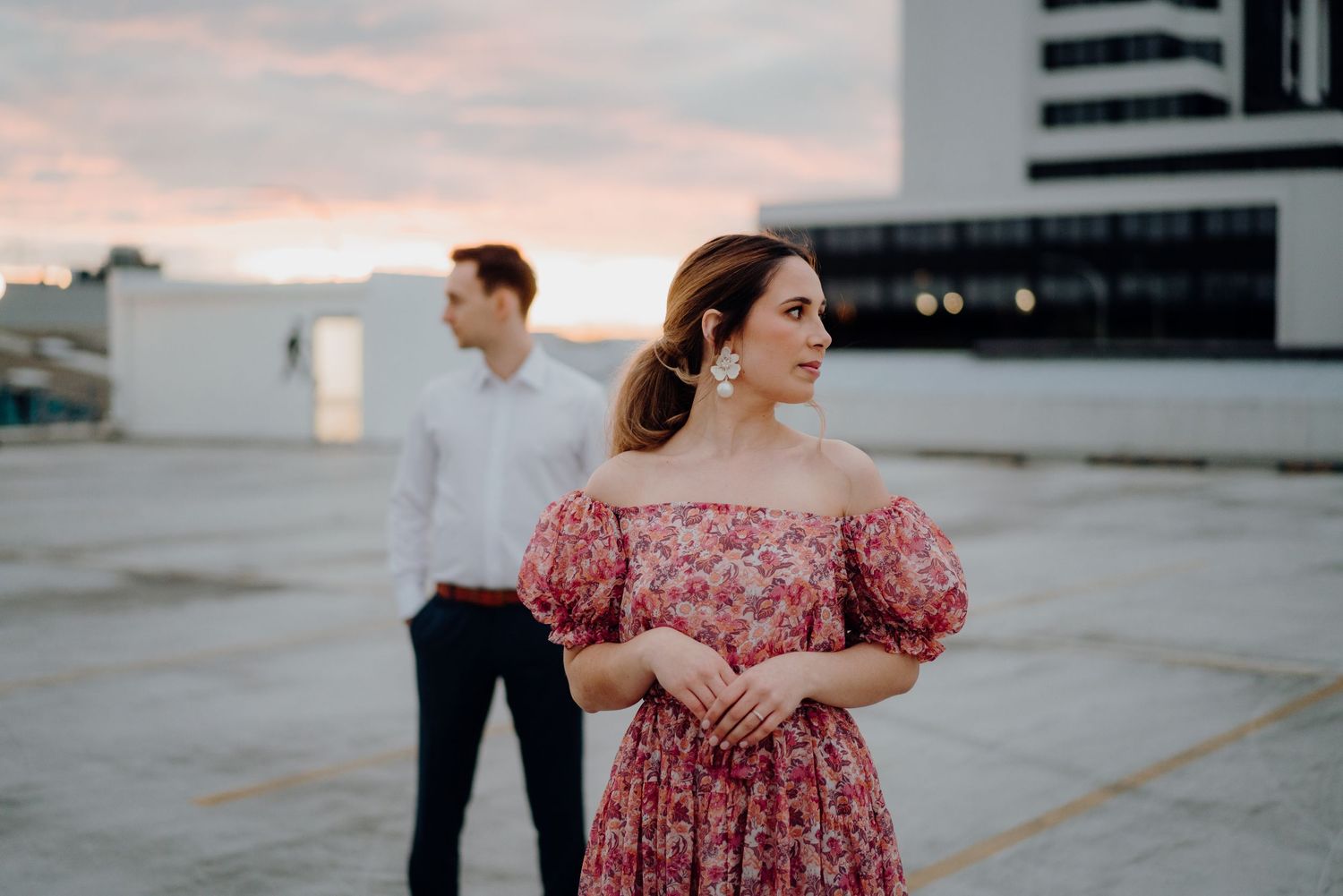 Couple photoshoot on rooftop during sunset