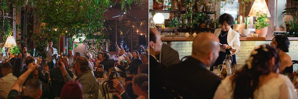 Lively wedding reception with guests dancing and socializing under decorative lighting.