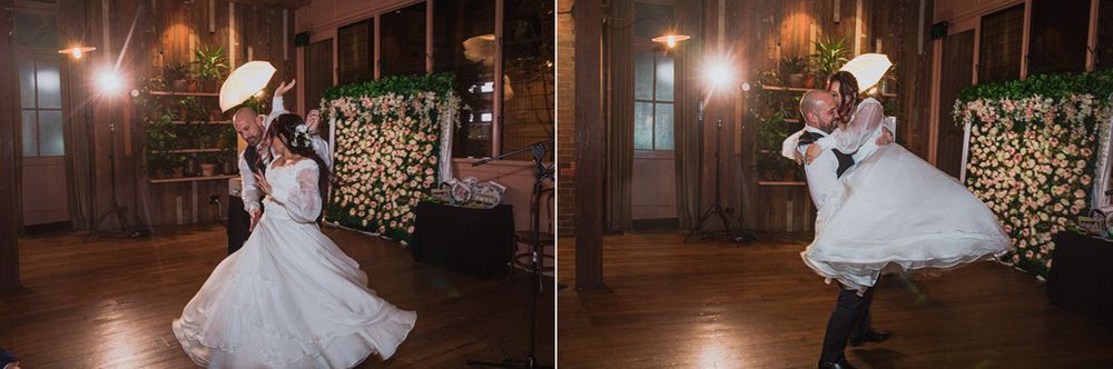 Couple performing their wedding dance in a beautifully lit indoor venue.