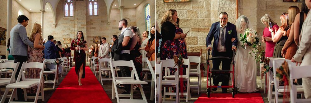 Wedding ceremony guests seated in church pews with red carpet aisle.
