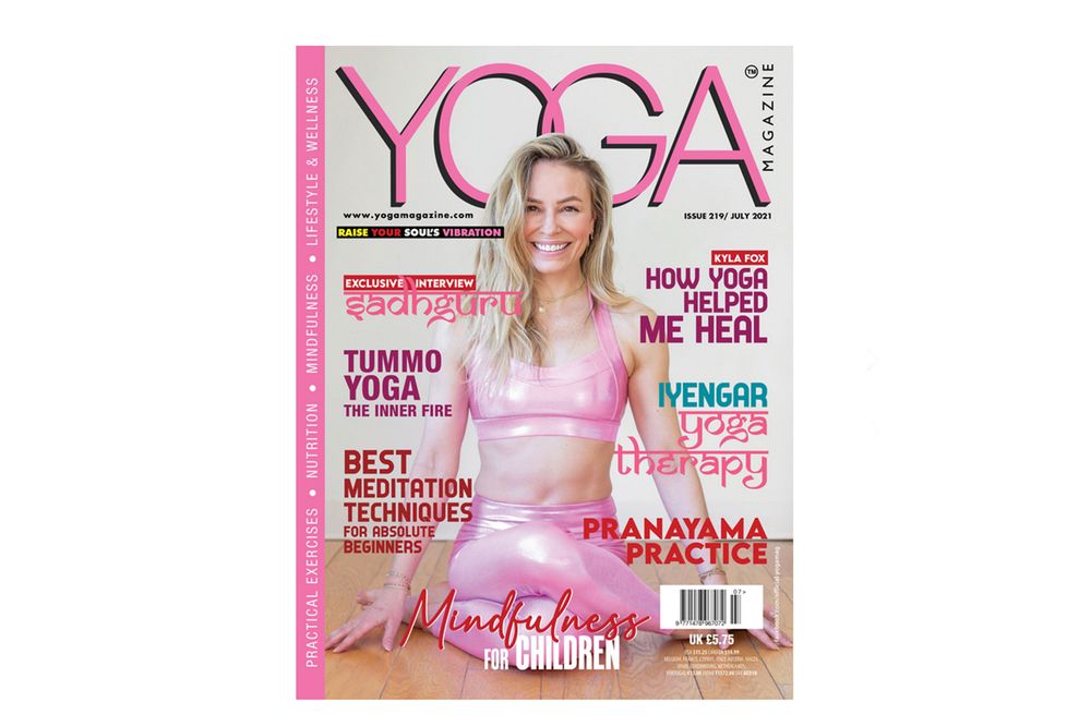 Pink yoga magazine cover featuring wellness and lifestyle content.