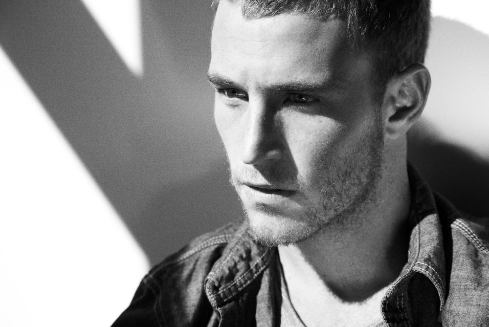 Natural lit black and white photo in studio.