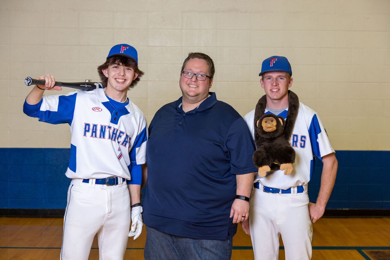 Photographer with 2 ball players.