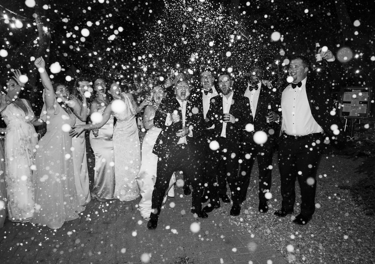 Black and white photo of celebration with champagne spray!