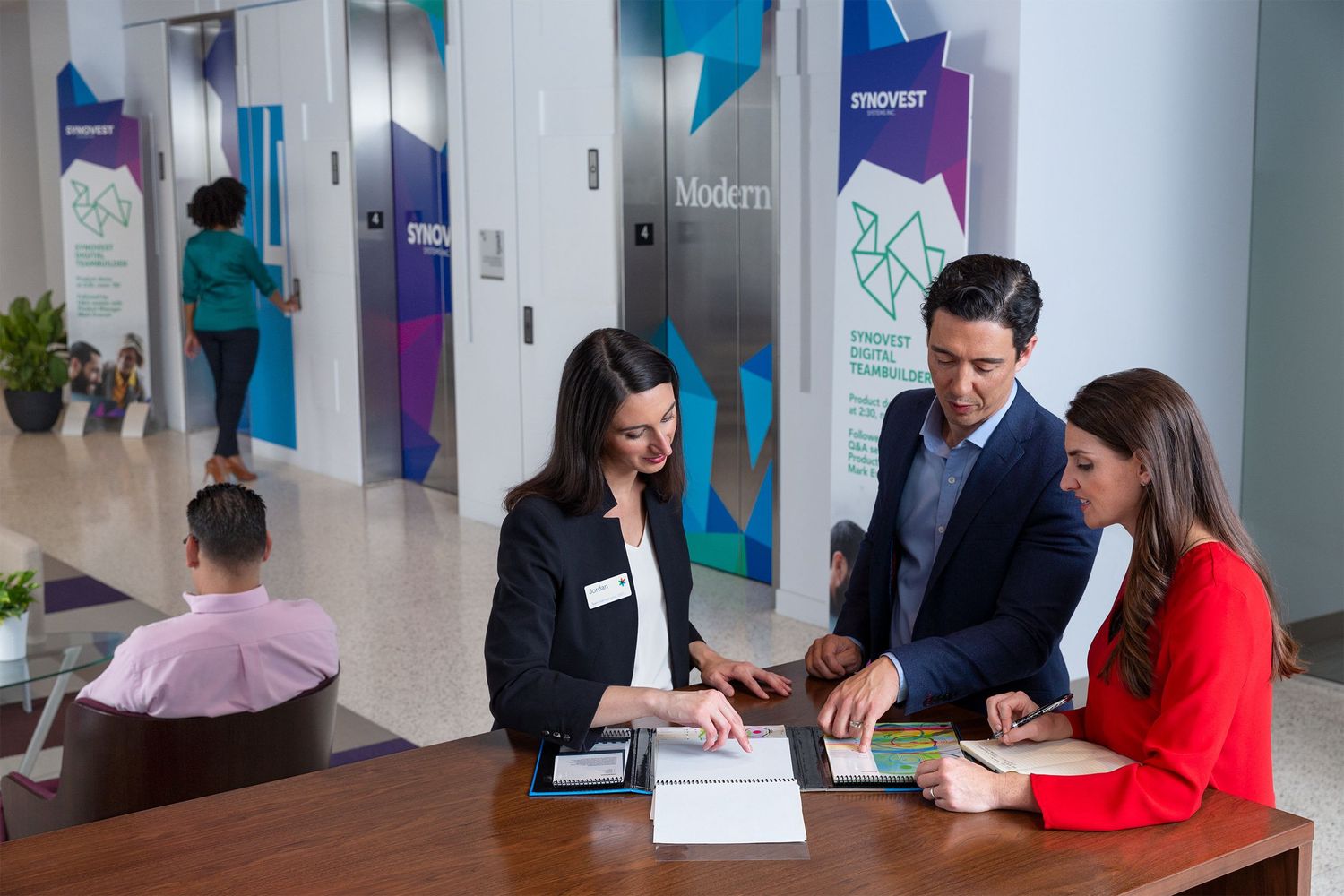 Custom, large format graphics printed by FedEx Office, are applied to the elevator doors of a convention center.