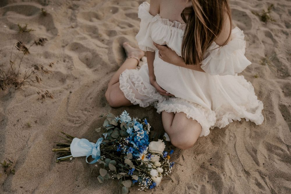 Artistic beach photography sequence showing woman in white dress with blue floral arrangement.