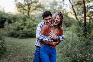 cute young couple photoshoot kent park oxford iowa sage and ivy studio corridor