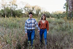 cute young couple photoshoot kent park oxford iowa sage and ivy studio corridor