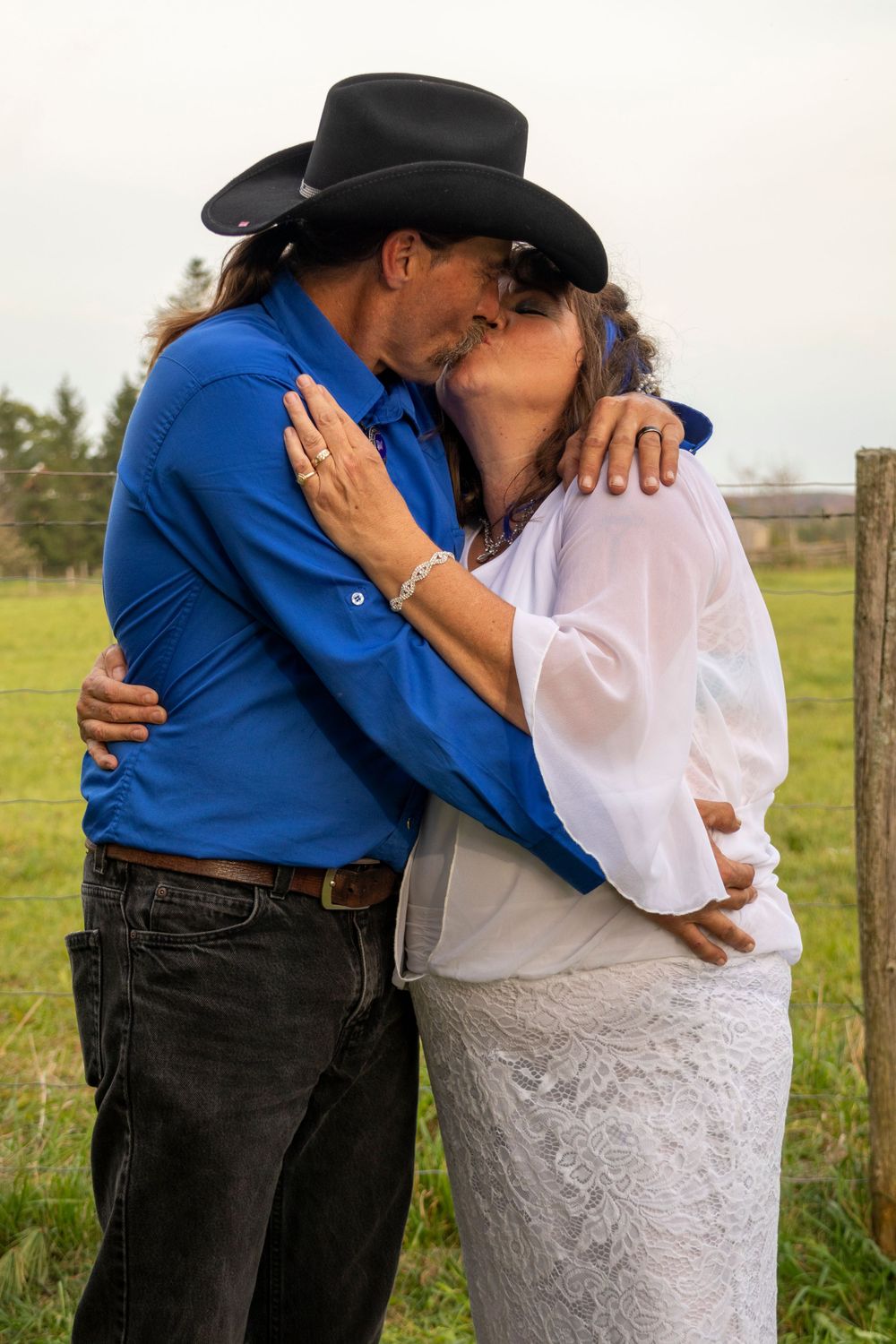 Bride and groom kissing