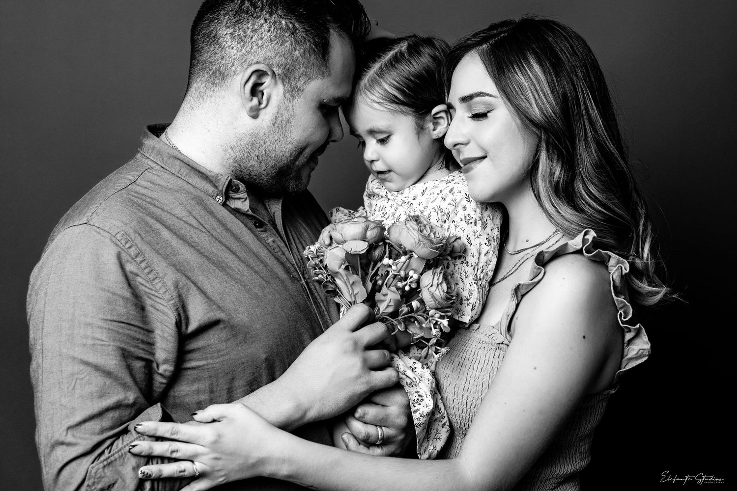 Vancouver Wedding Photographer Family Hugging Mother Daughter Dad Black and white