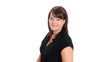 Female studio headshot body to the side