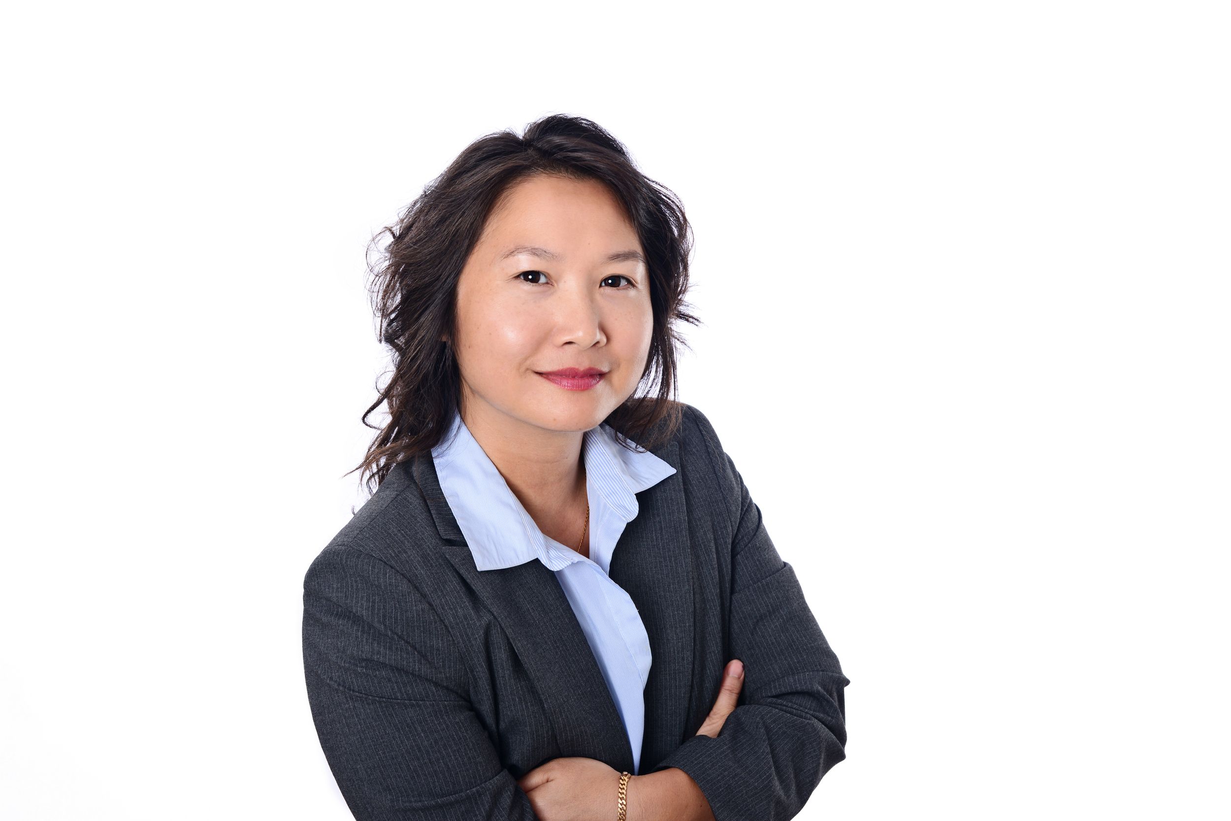 Female studio headshot arms folded