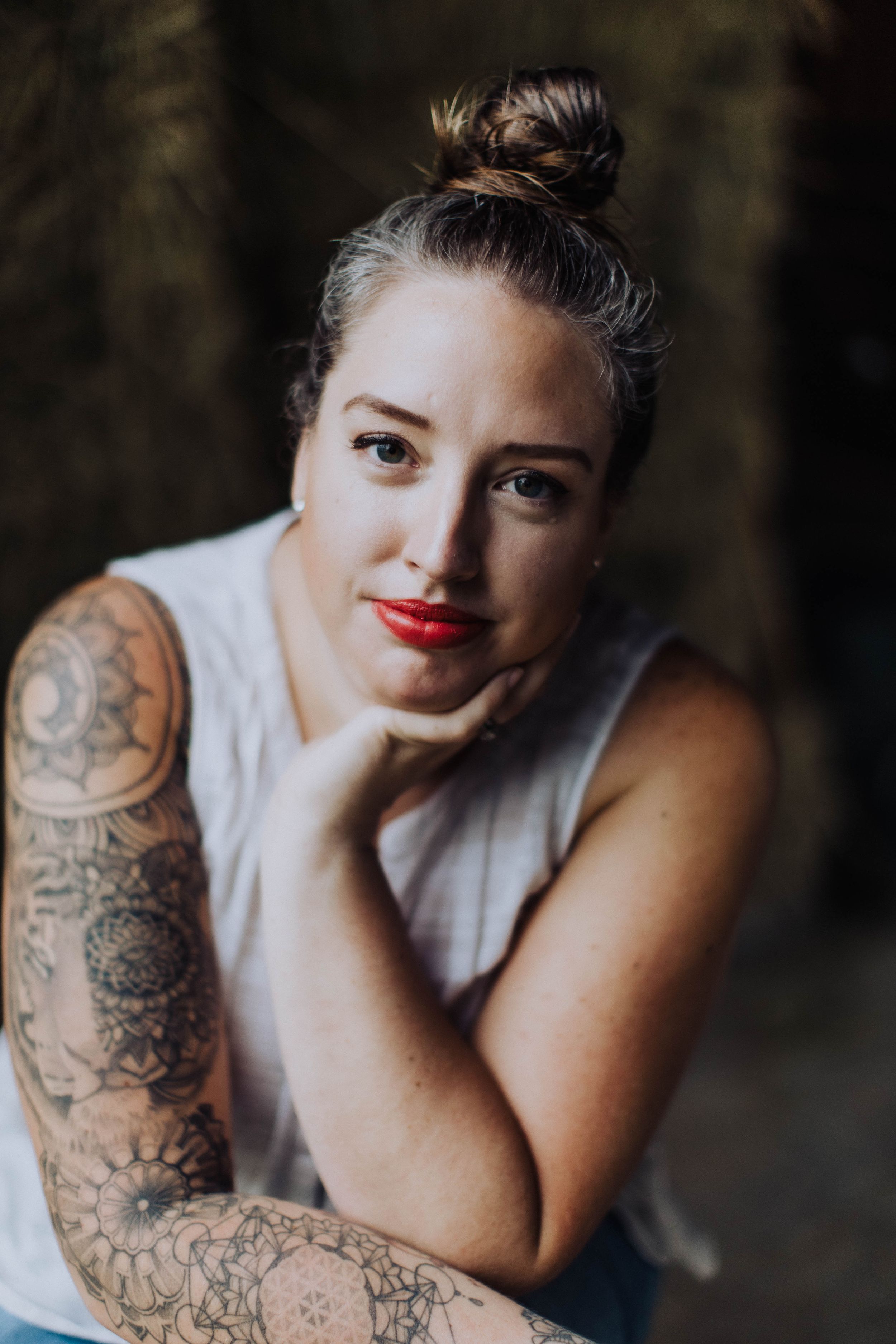 Portrait series showcasing tattoo art and vintage style makeup.