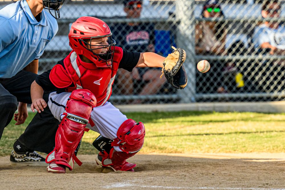 youth boys baseball player game action photo catcher frisco texas