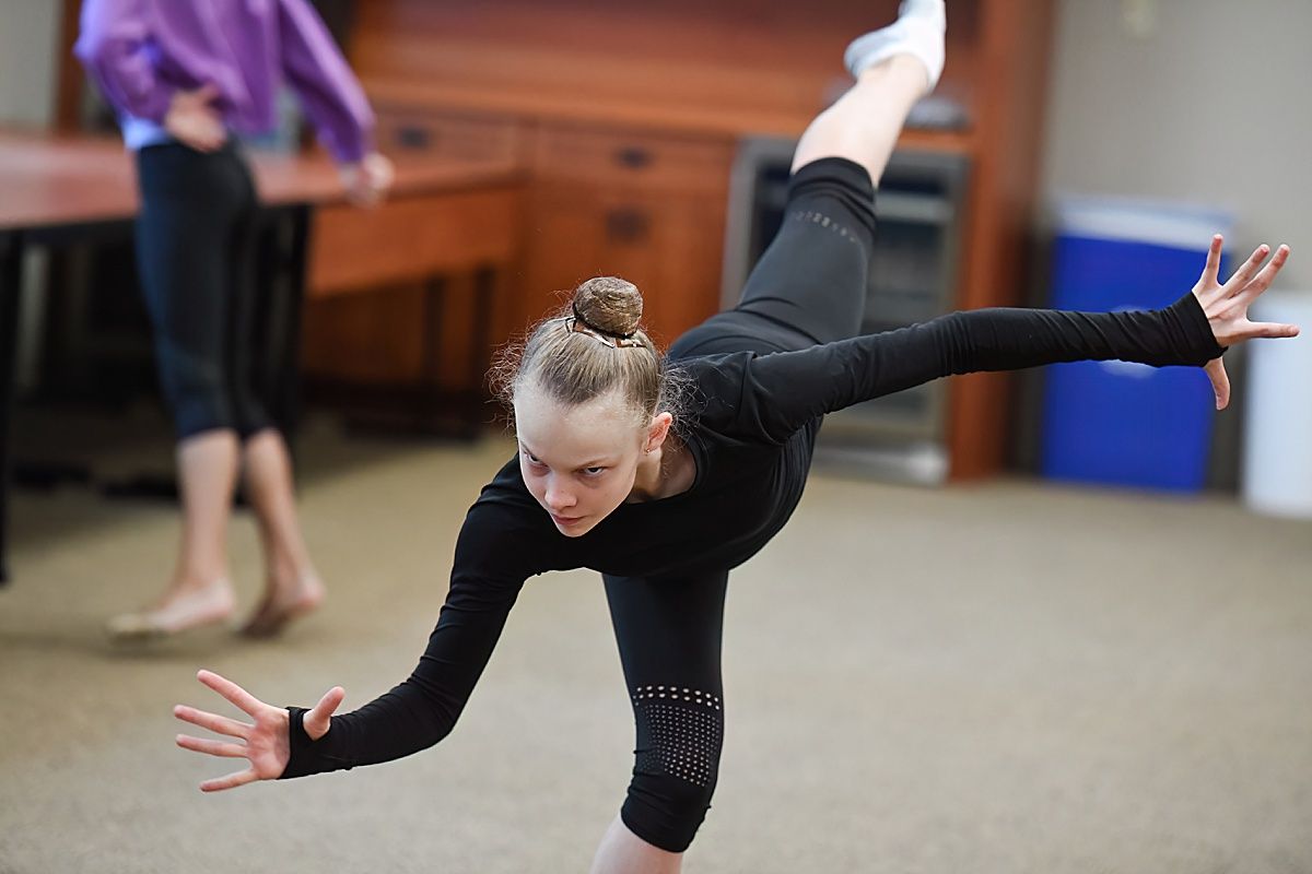 Expressive Rhythmic Gymnast Practicing