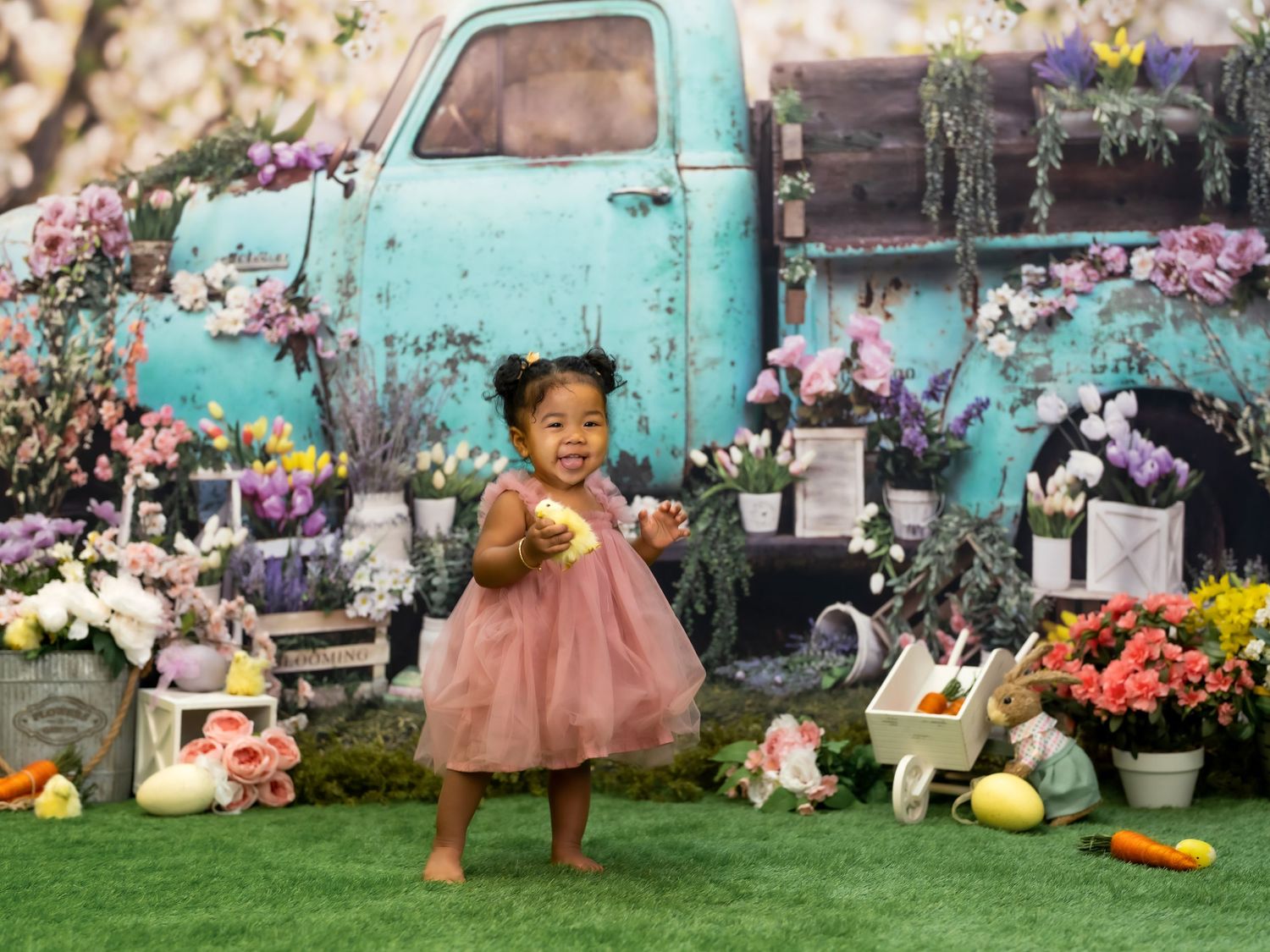 Spring Blue Truck enjoying a 1st birthday cake smash session in a Bothell studio.  birthday photography by Filling the Frame Photography