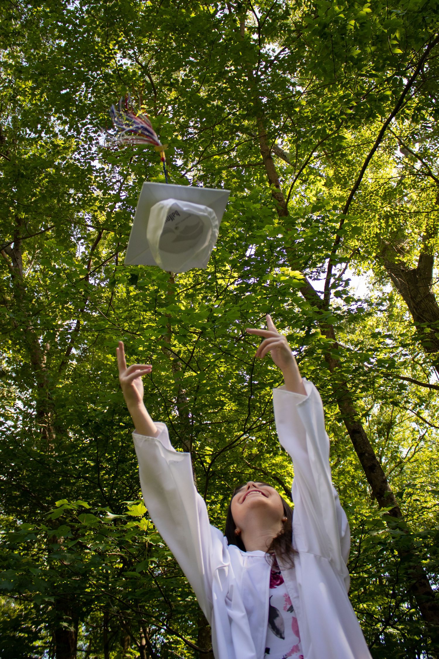 cap toss during cap and gown session Tolland Connecticut