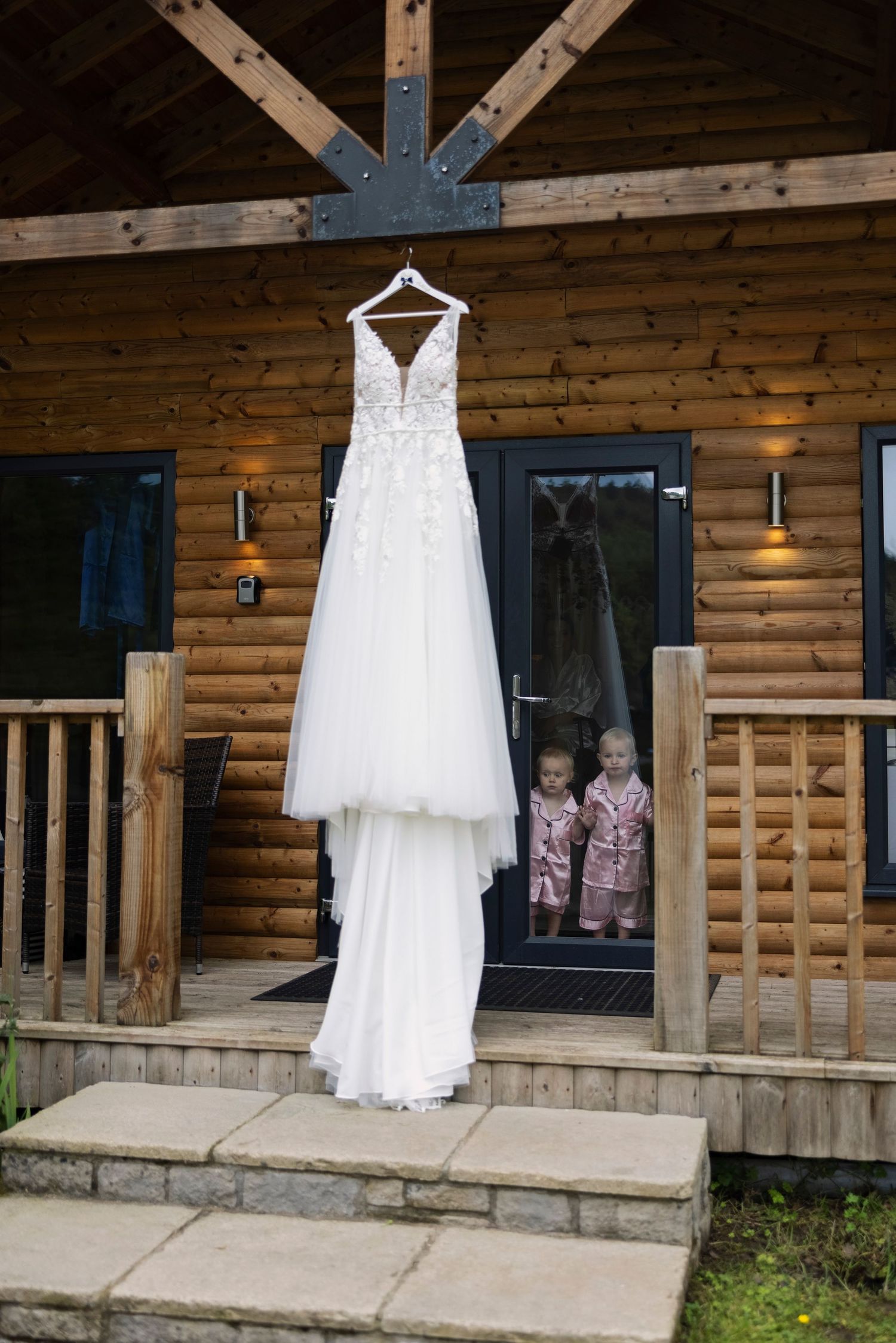 gorgeous children looking at beautiful wedding dress
