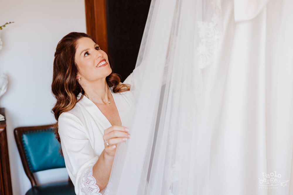 Morning preparation scene with white robe and sheer curtains.