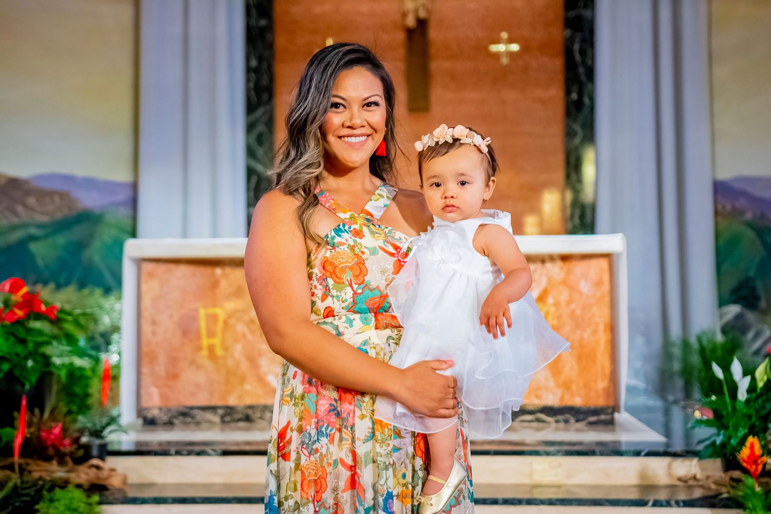 Summer portrait on church steps with floral dress and outdoor scenery.