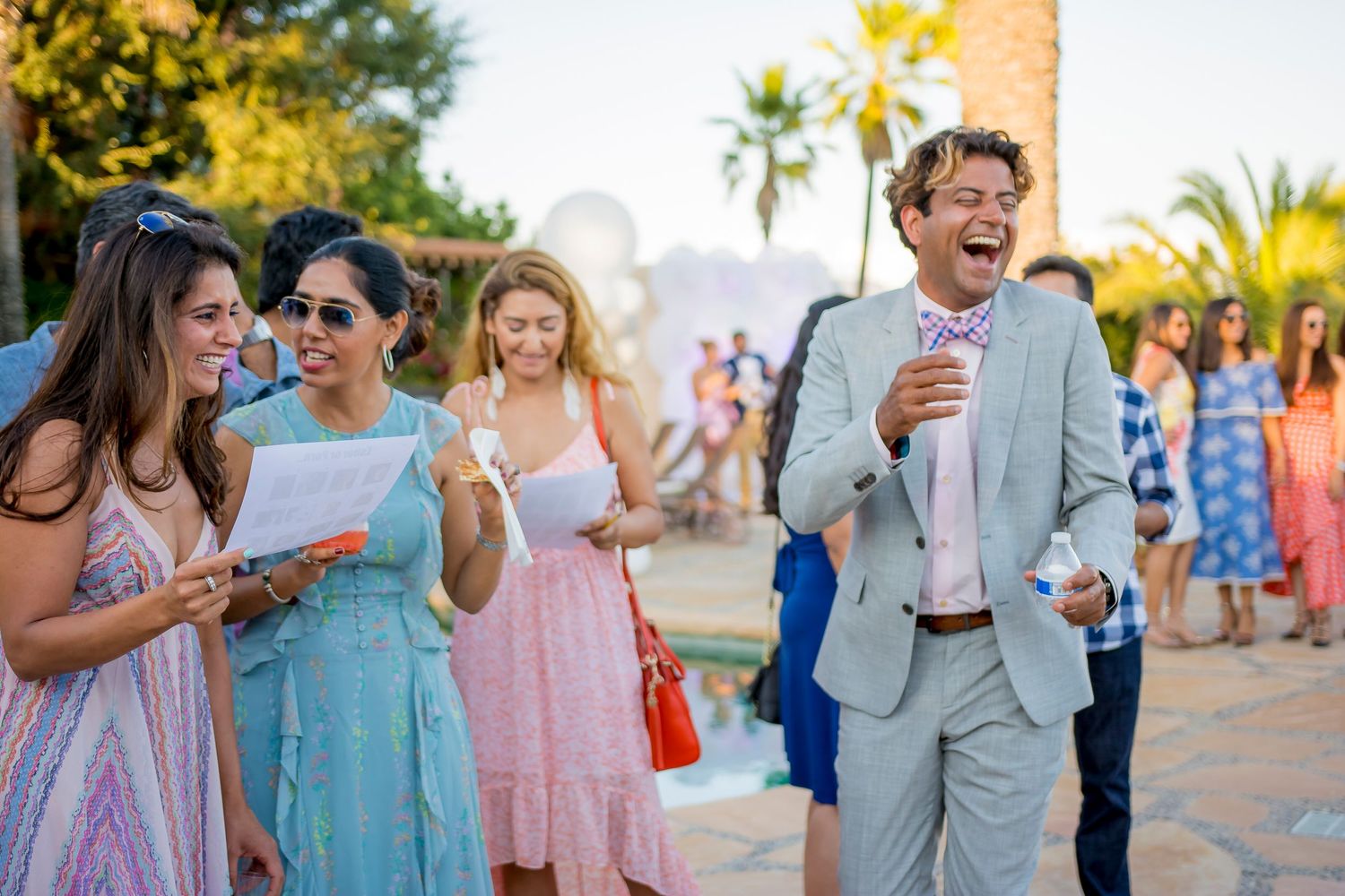 Guests enjoying themselves at an outdoor celebration event.