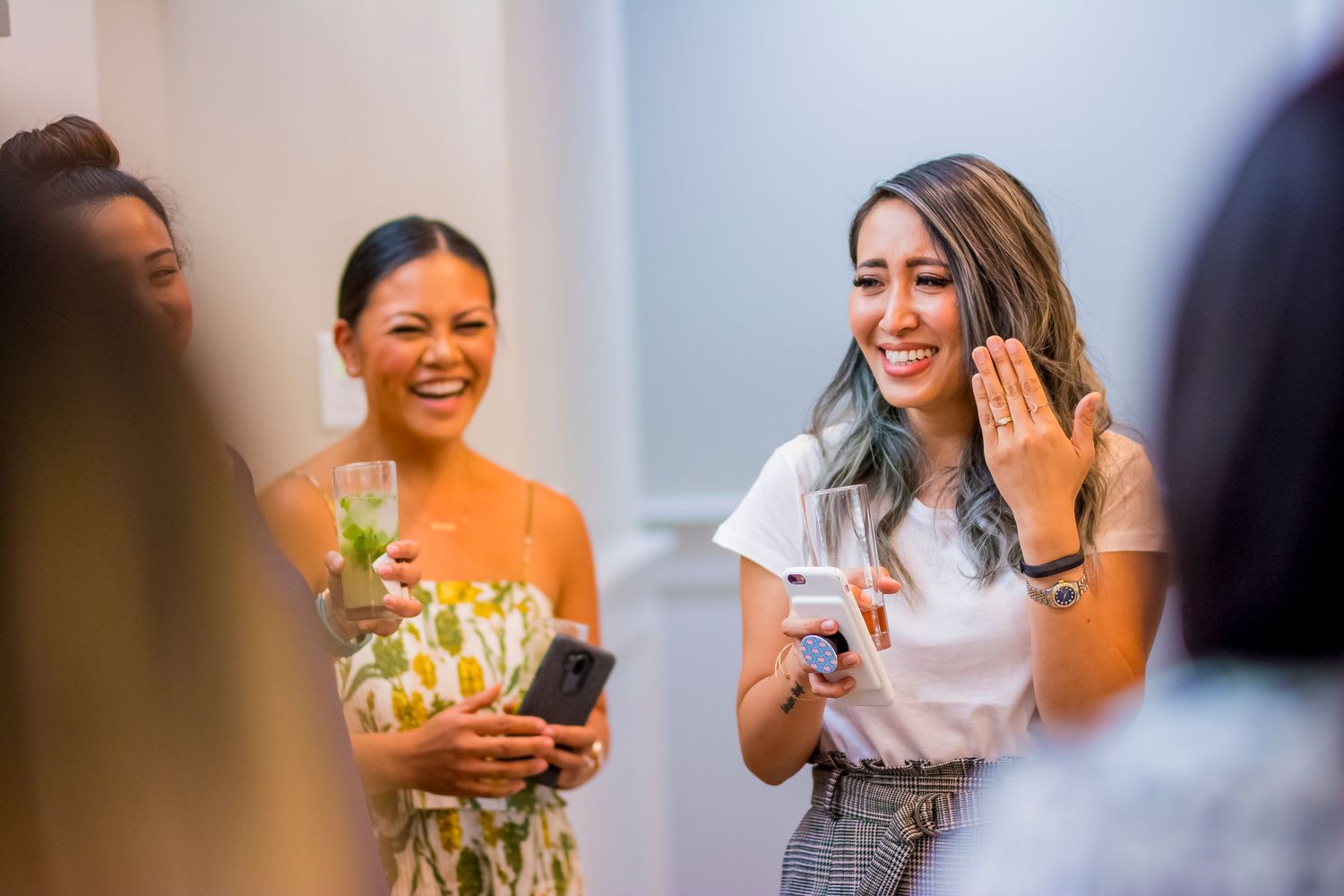 A celebratory moment captured during a special event with joyful reactions.