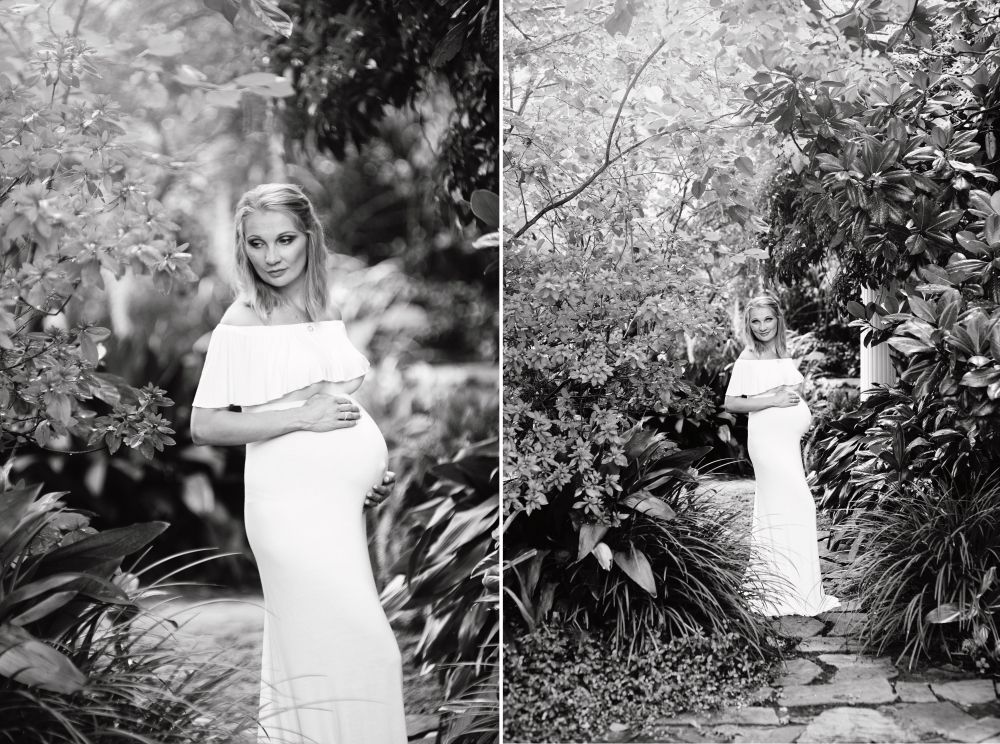 Black and white maternity portraits taken in a lush garden setting.