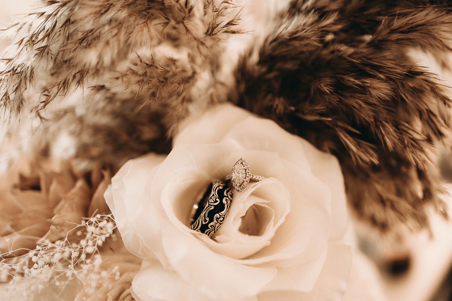 detail shots of wedding rings in a flower