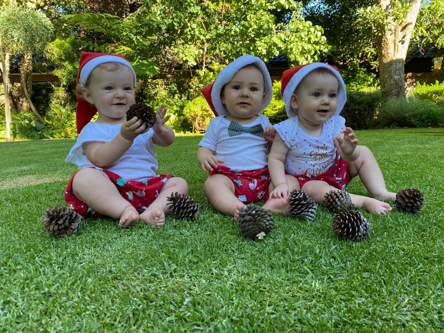 Multiple images of baby sitting on grass wearing red and white polka dot outfit.