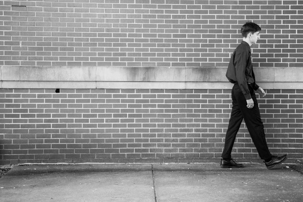 High school graduation walking black and white Cara Dawn Photography