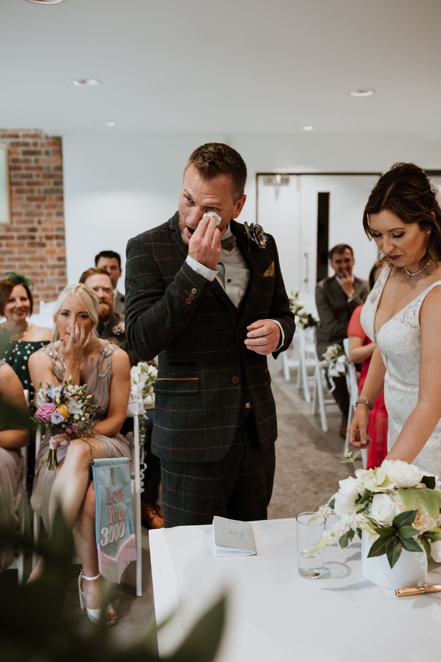 Candid and emotive wedding photographer
