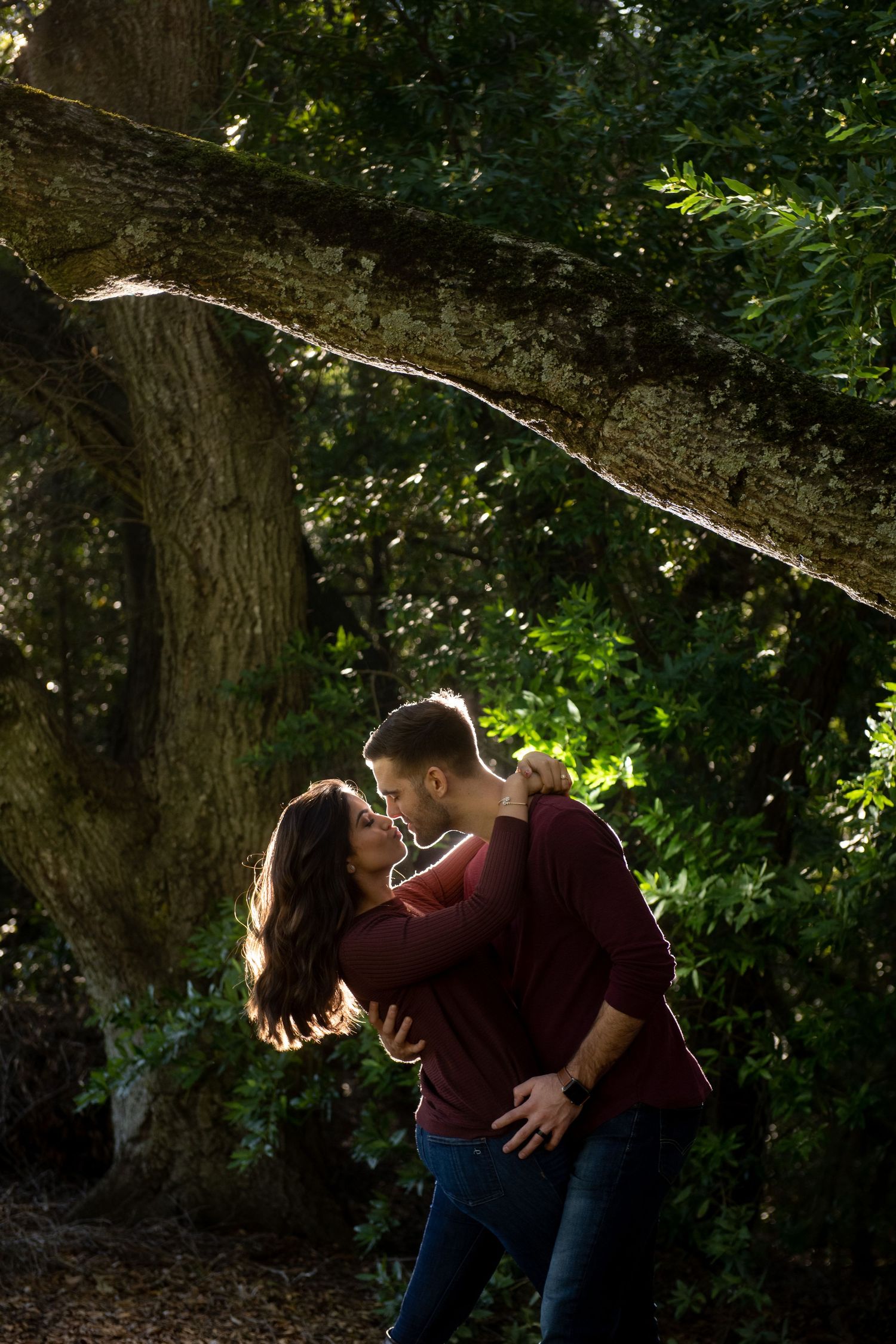 Couple dip and dramatic light in back, Birones Park, 1611 Bear Creek Road, Lafayette CA.