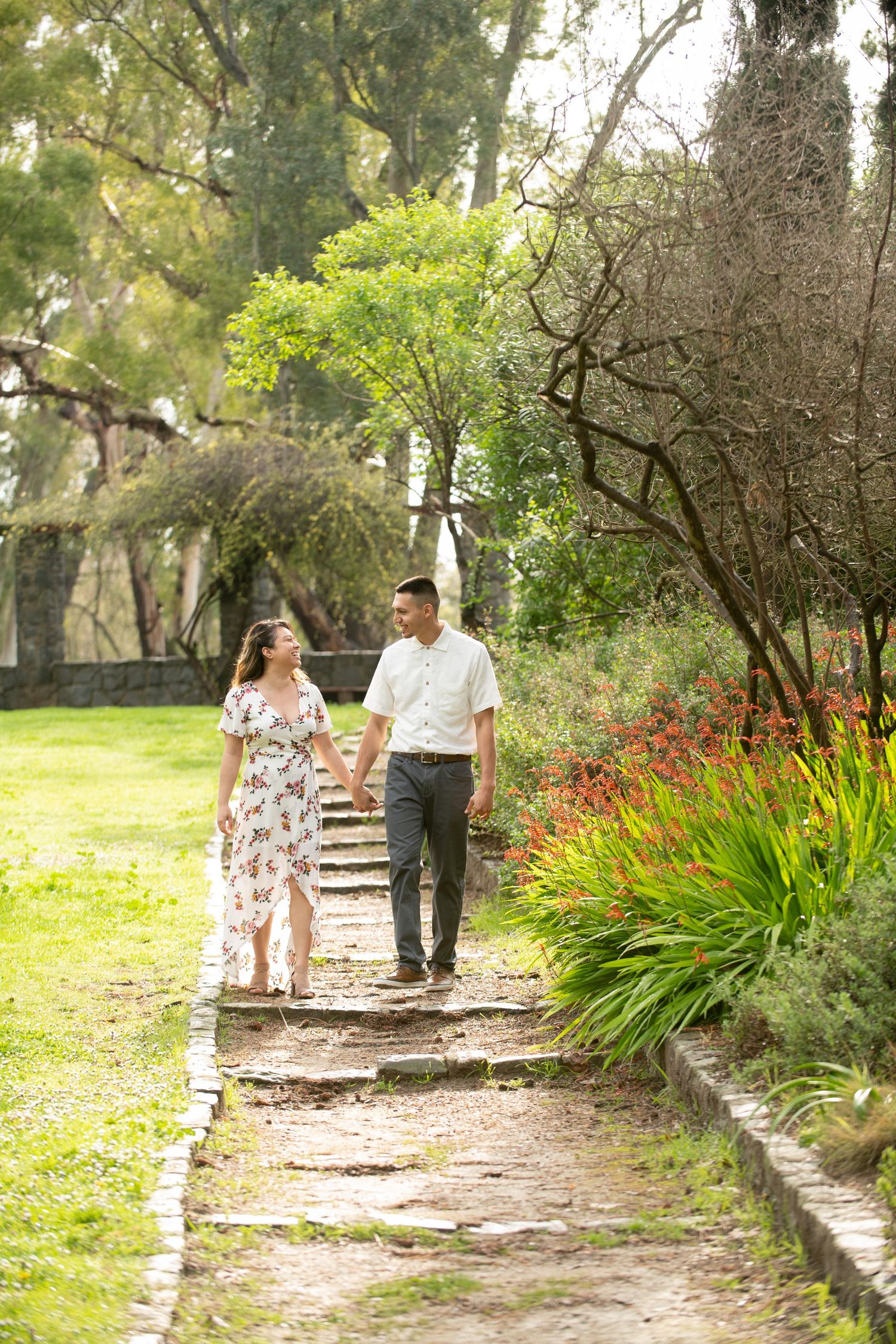 couple walking hand in hand, Rock Garden, William Land Regional Park, 15th Ave, Sacramento CA.