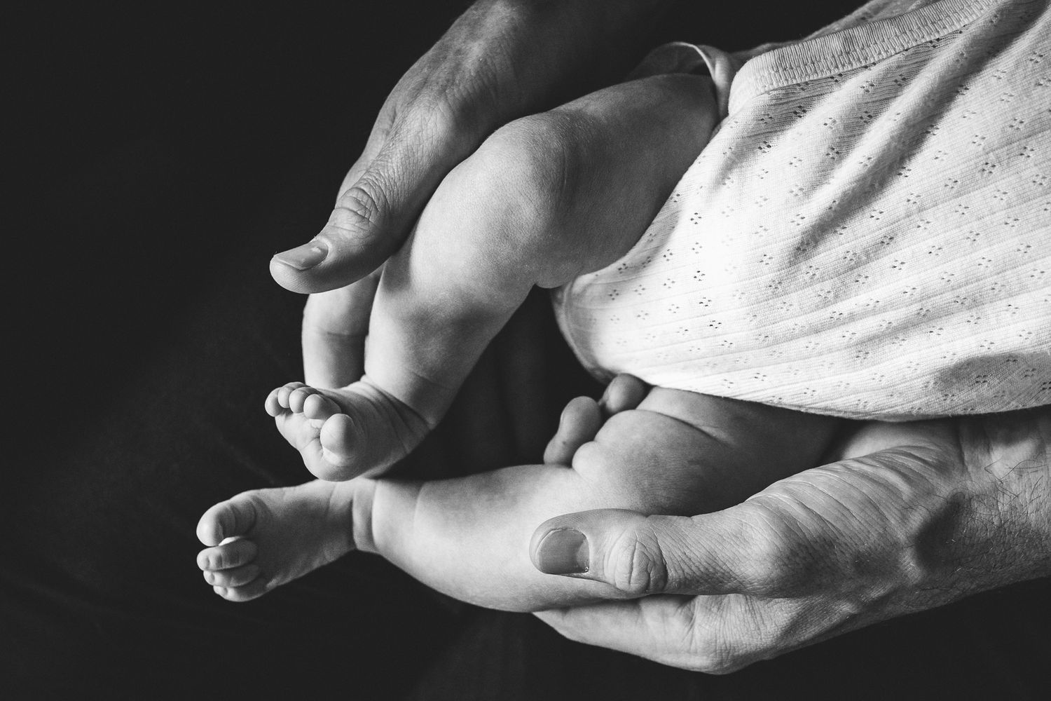 Secure and safe in the arms of Dad.