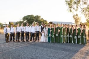 bridal party portraits at Orland, California Wedding with barn and trees behind them