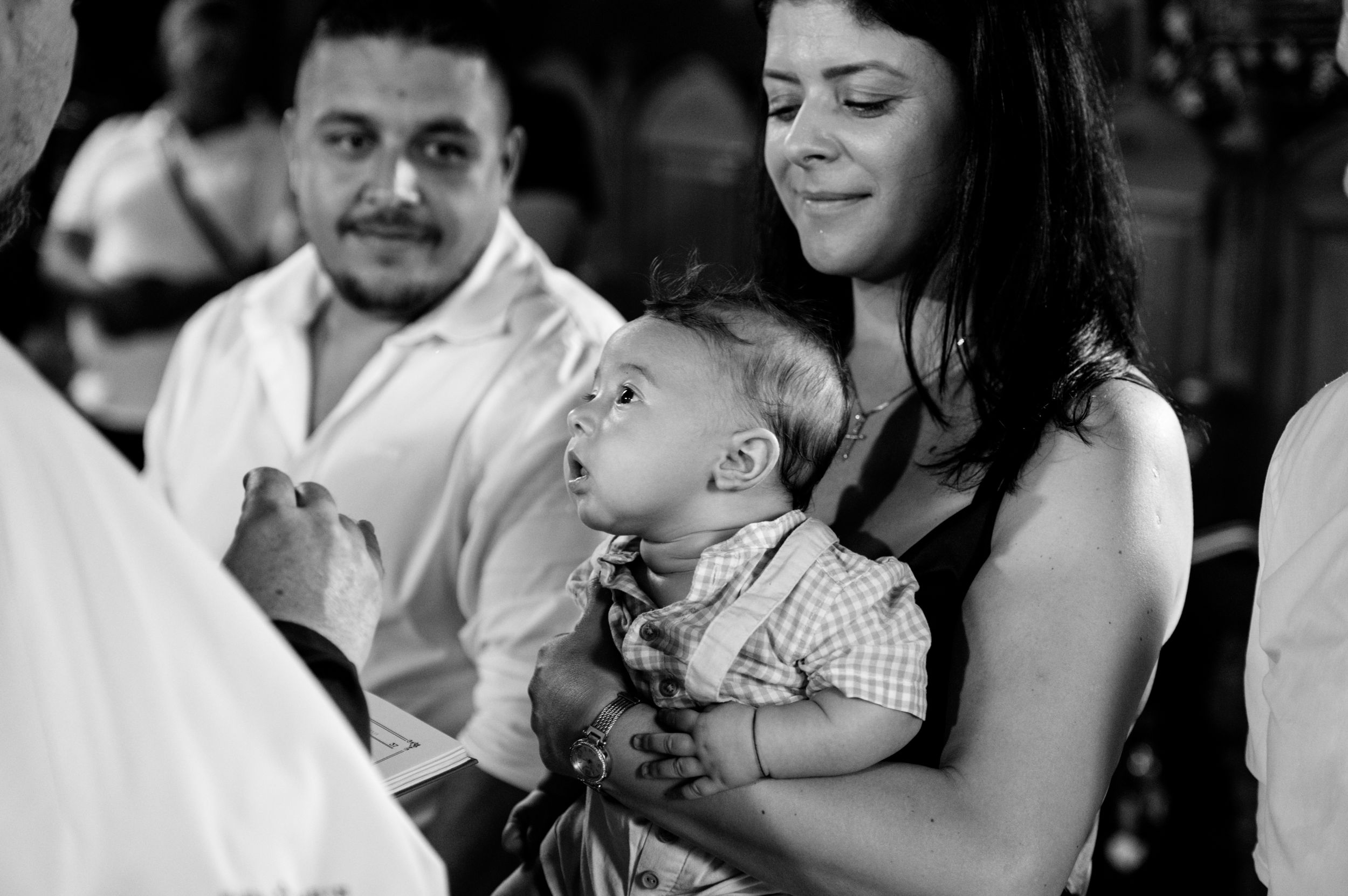 A candid moment captured during a wedding reception celebration.