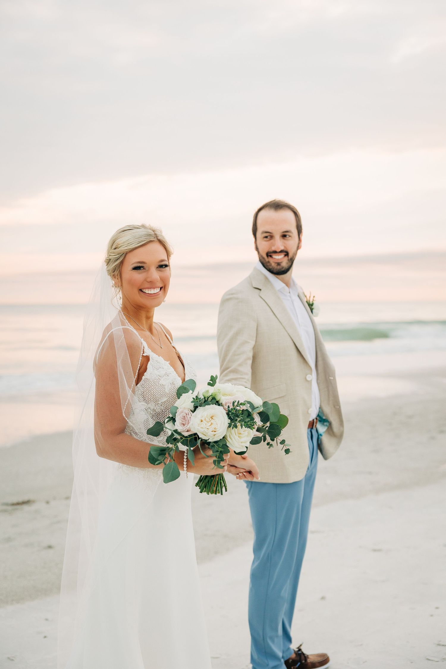 Bride and Groom at the Longboat Key Club. Photograph taken by Sarasota wedding photographer Samantha Brown Artistry.