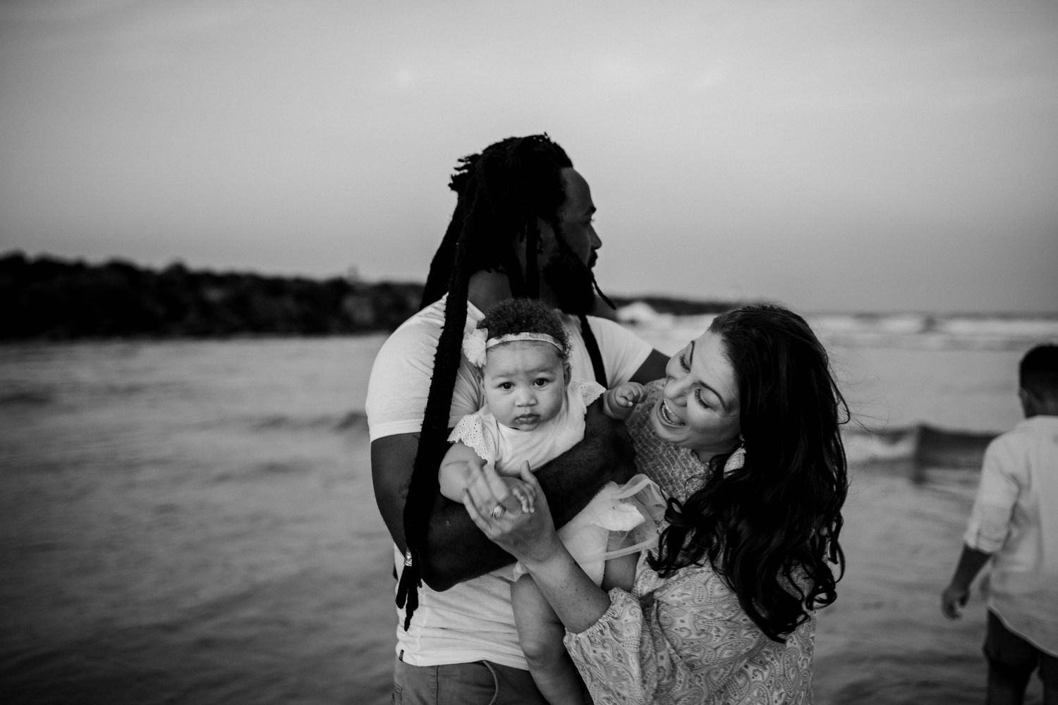family playing on the beach at the spit on the Gold Coast