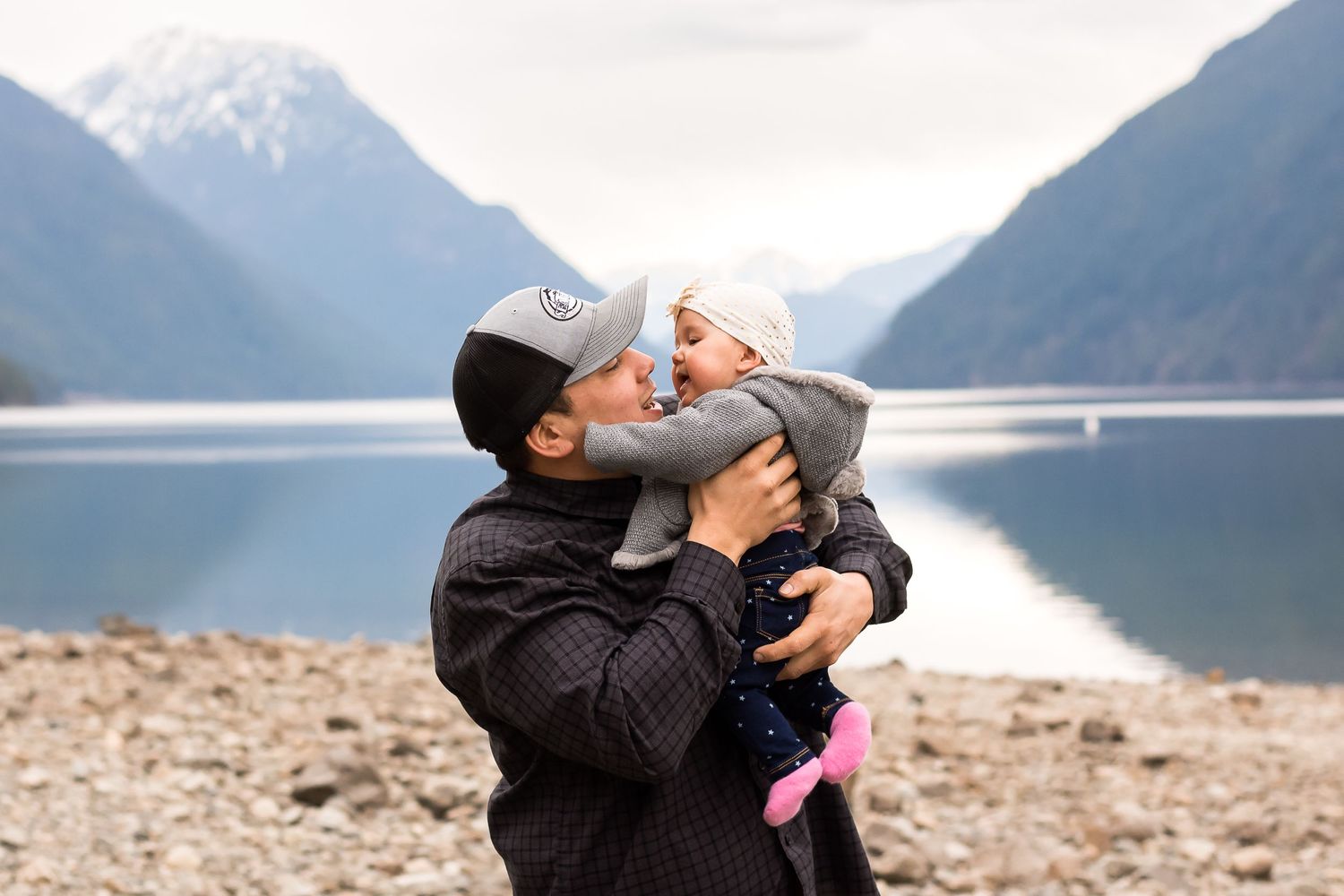 Dad and baby daughter at Alouette Lake in Maple Ridge