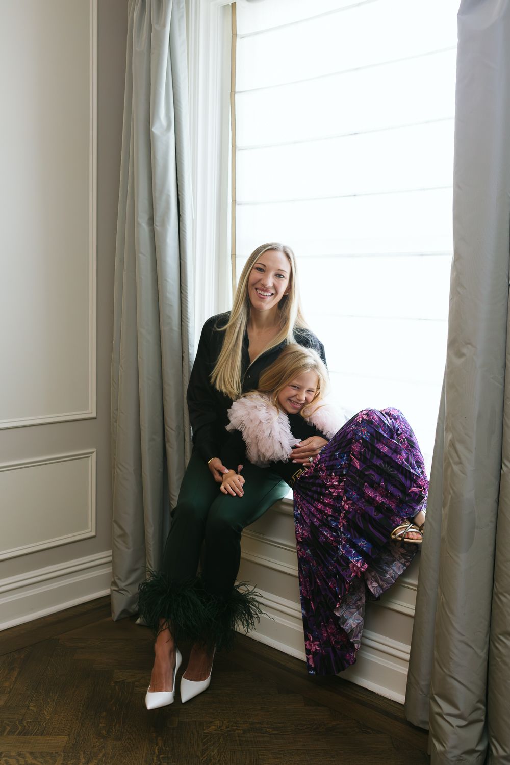 Heartwarming laughter between Mom and daughter, photo by NYC best family photographer Paula Ortiz
