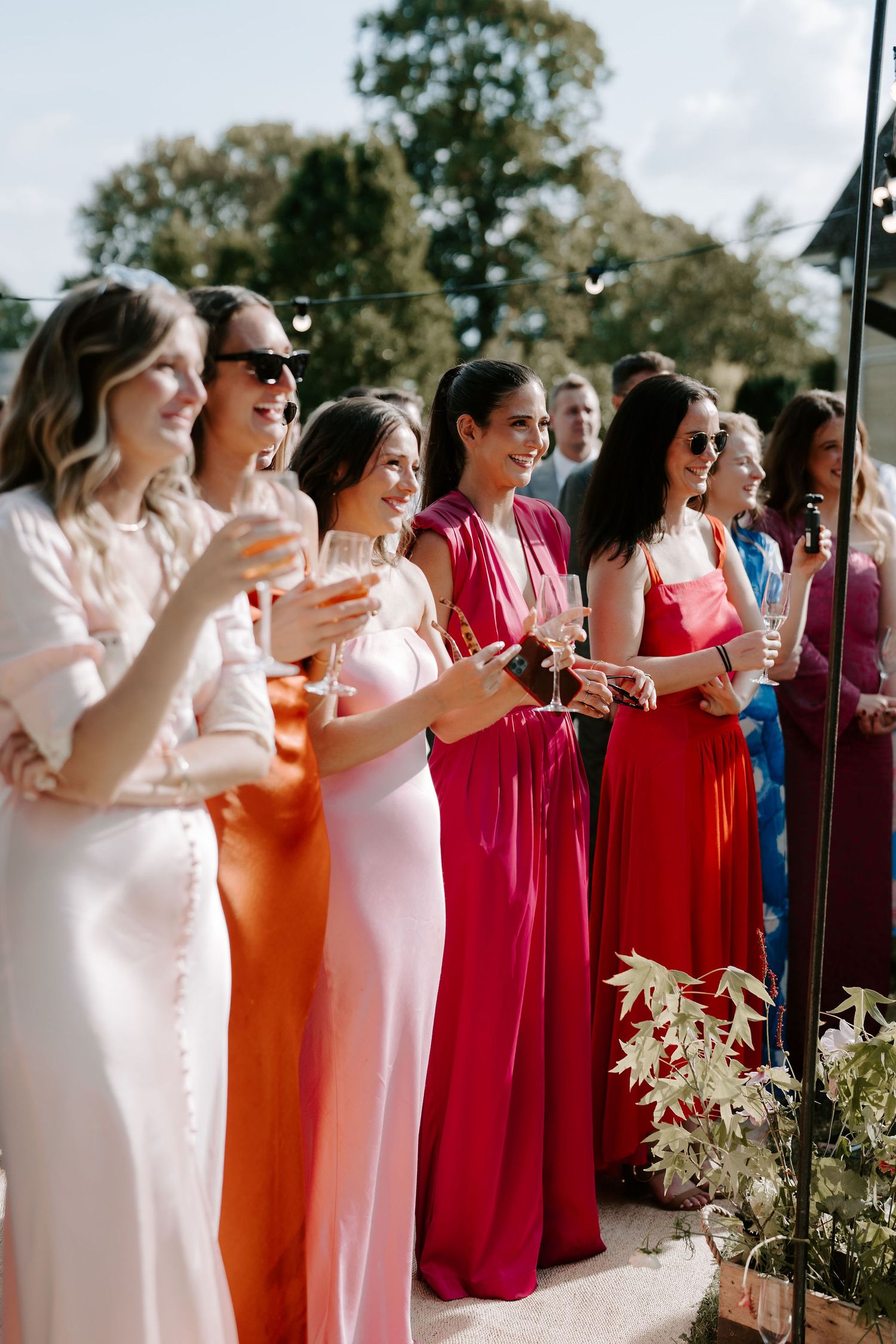 wedding guests enjoying speeches at marquee wedding in islip in Oxfordshire