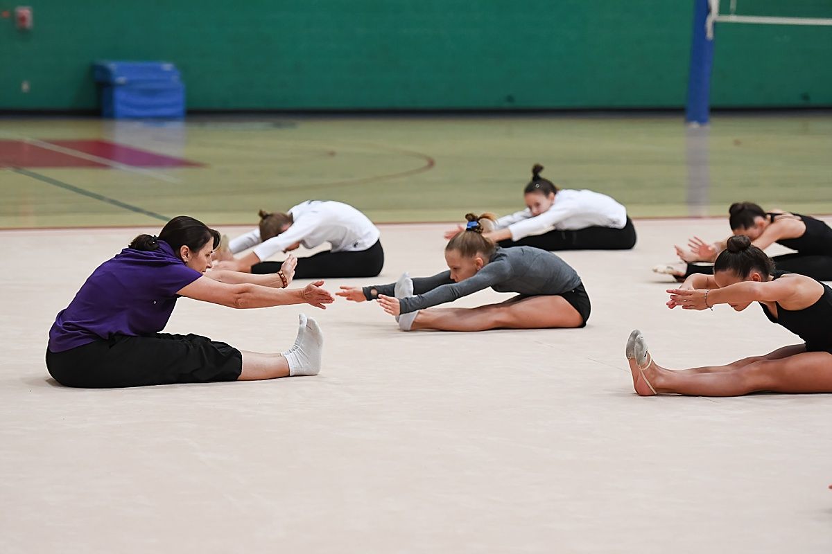 Gymnasts in pike stretch photographer from Indianapolis