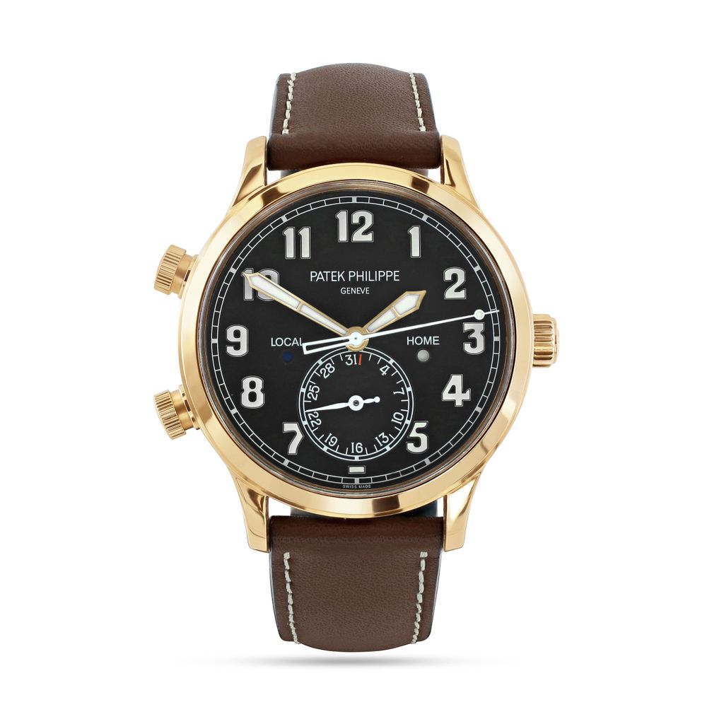 Luxury Patek Philippe wristwatch with black dial and brown leather strap.